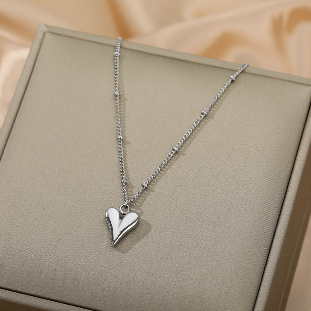 Damen Halskette mit herzförmigem Anhänger aus hochwertigem Edelstahl Shop Nory