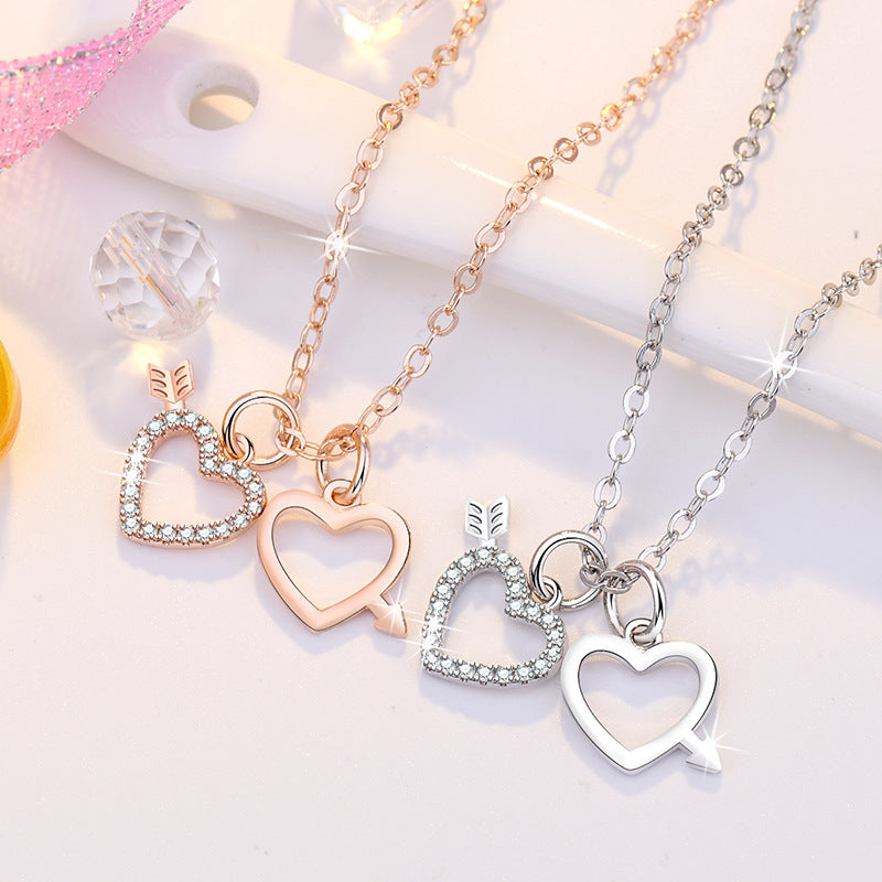 Damen Halskette mit doppeltem Herz- und Pfeilmotiv aus hochwertigem Edelstahl Shop Nory