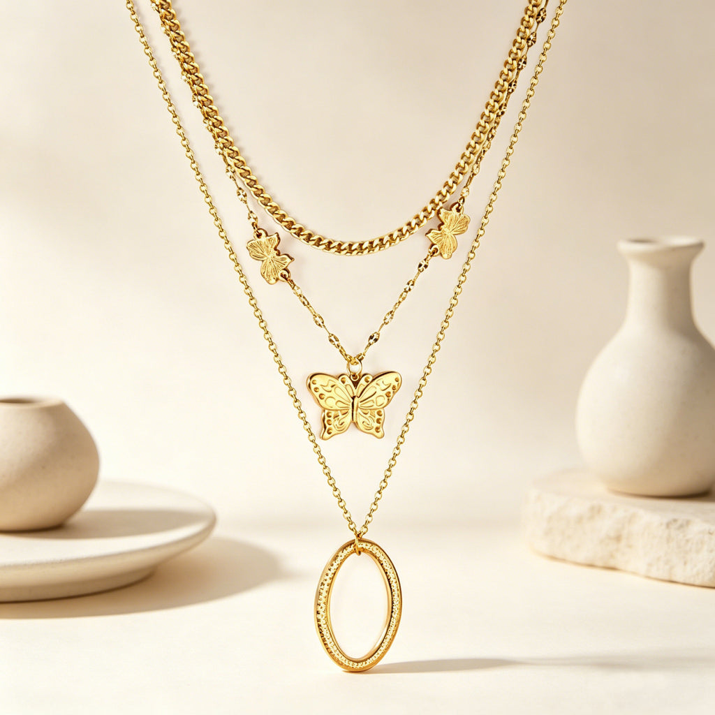 Damen mehrlagige Halskette mit goldplattierten Schmetterlingsanhängern und eleganten Edelstahl-Details Shop Nory