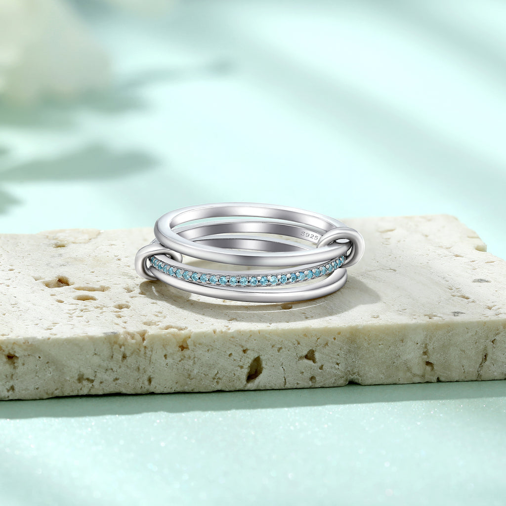 Damen Ring mit geschwungenem Design und funkelnden Zirkonia-Elementen Shop Nory