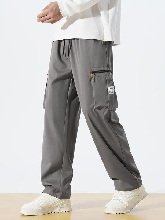 Herren Locker geschnittene Utility‑Cargohose mit Tunnelzugbund, Reißverschluss‑Beintaschen & geradem Bein Shop Nory