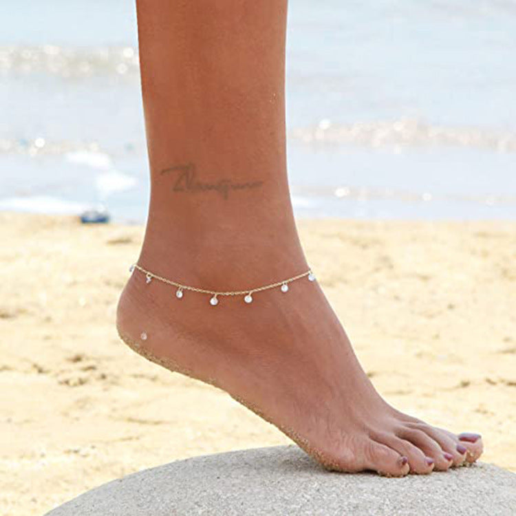 Damen Fußkettchen mit funkelnden Kristallanhängern und zartem Golddesign Shop Nory