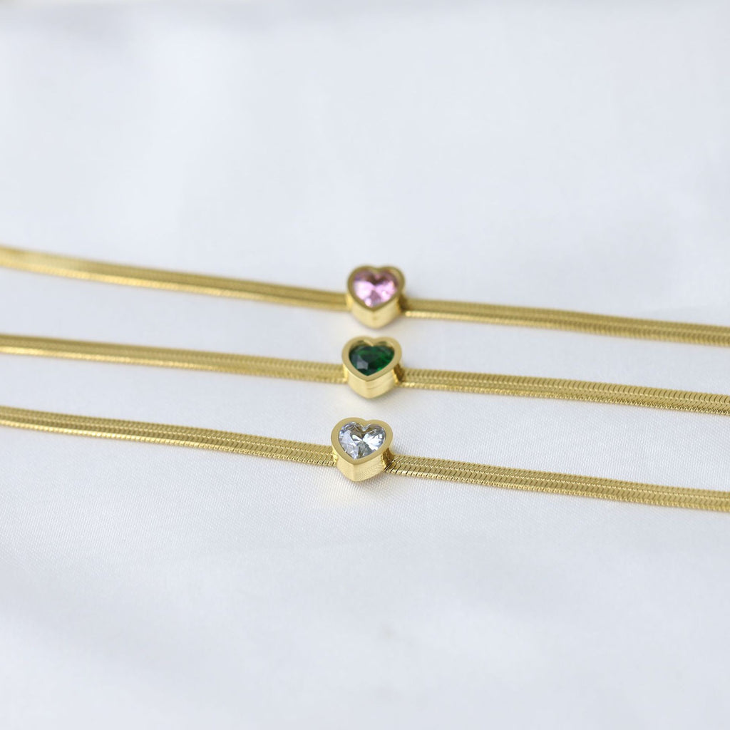 Damen Armband mit grünem Herz-Anhänger und elegantem Drahtdesign Shop Nory