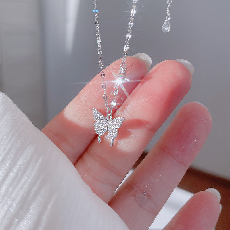 Damen Halskette mit filigranem Schmetterlingsdesign und funkelnden Akzenten Shop Nory