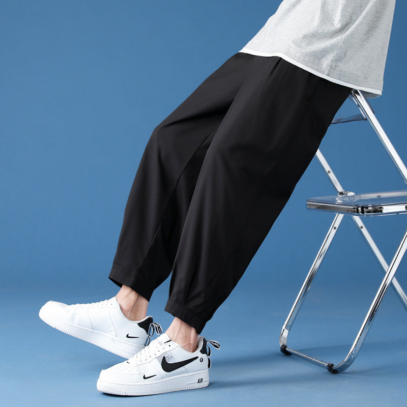 Herren weite technische Jogginghose mit elastischem Bund, gekräuseltem Beinabschluss und atmungsaktivem Stretchmaterial Shop Nory