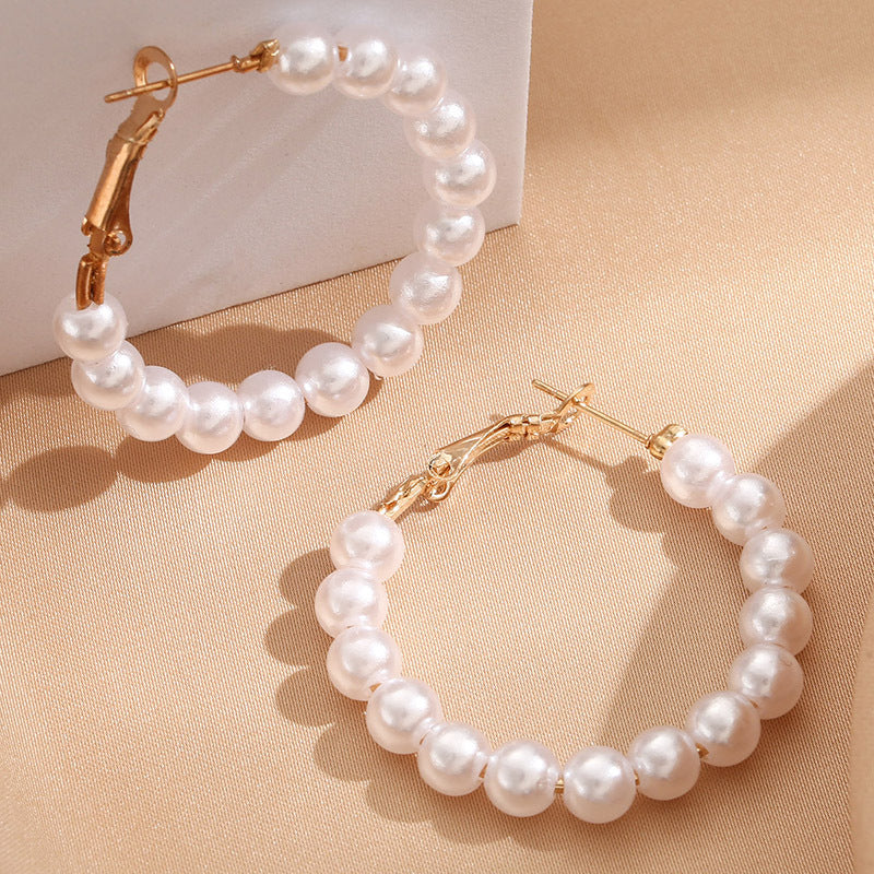 Damen Creolen mit luxuriösen Perlen und goldenen Akzenten Shop Nory