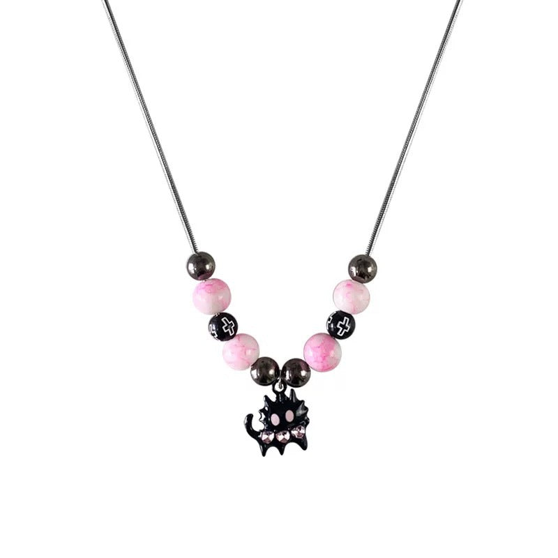 Damen Halskette mit verspieltem Katzenanhänger und bunten Perlendetails Shop Nory