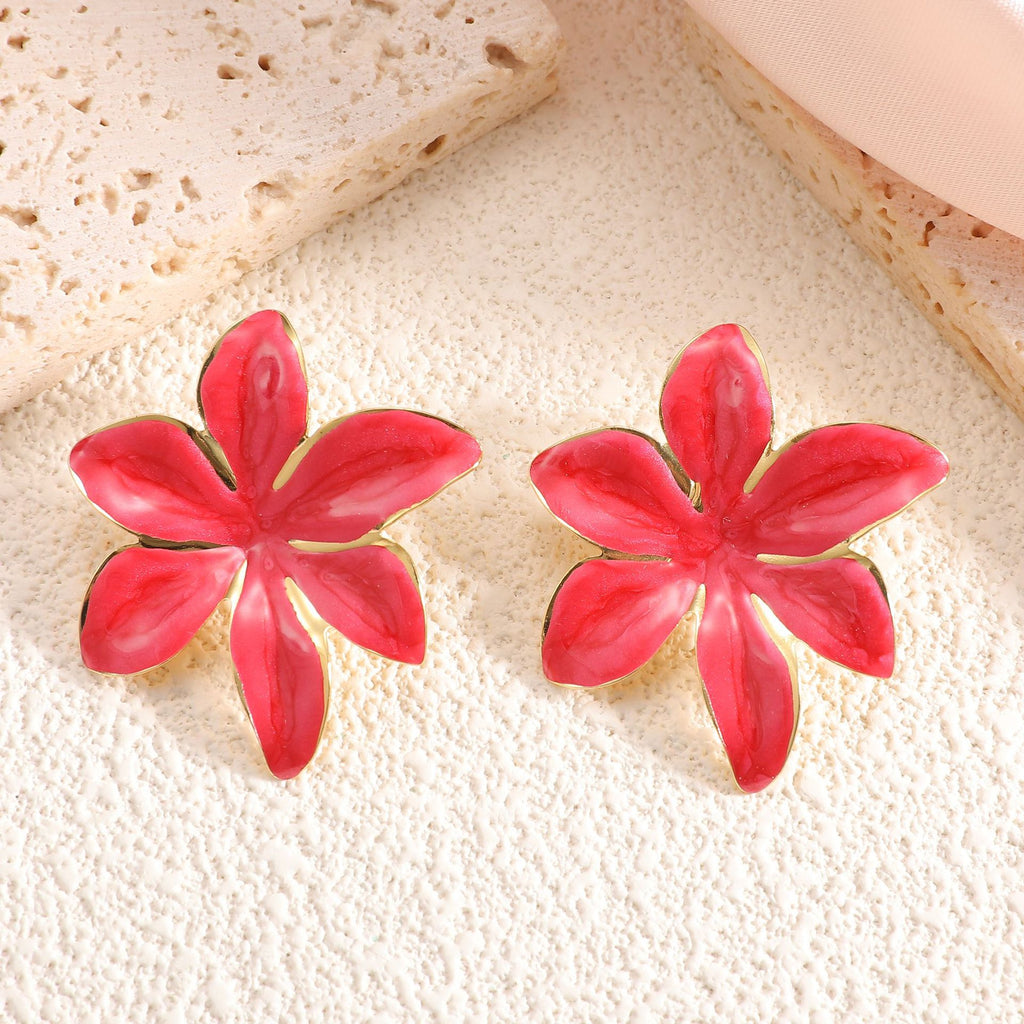 Damen Ohrringe mit floralem Design und elegantem Goldrand Shop Nory