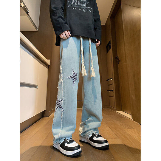 Damen Weite High‑Waist Denimhose mit Stern‑Applikationen, Fransen‑Seitenschlitzen und Kordelbund Shop Nory