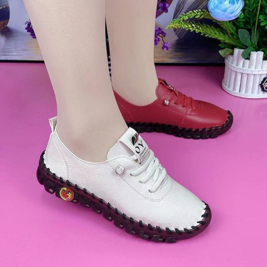 Damen Flexible Lederoptik-Sneaker mit handgenähter Kontrastnaht und profilierter Gummilaufsohle Shop Nory
