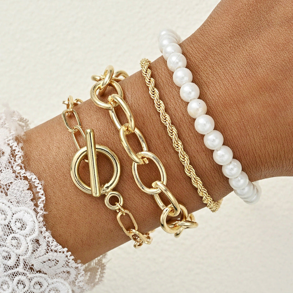 Damen Armreif-Set mit elegantem Gold- und Perlendesign Shop Nory