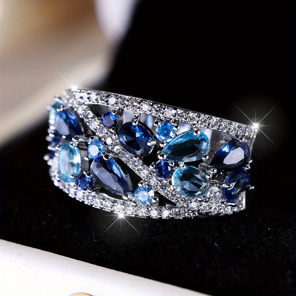 Damen Ring mit kunstvollem Rosé-Golddesign und funkelnden Zirkonia-Steinen Shop Nory