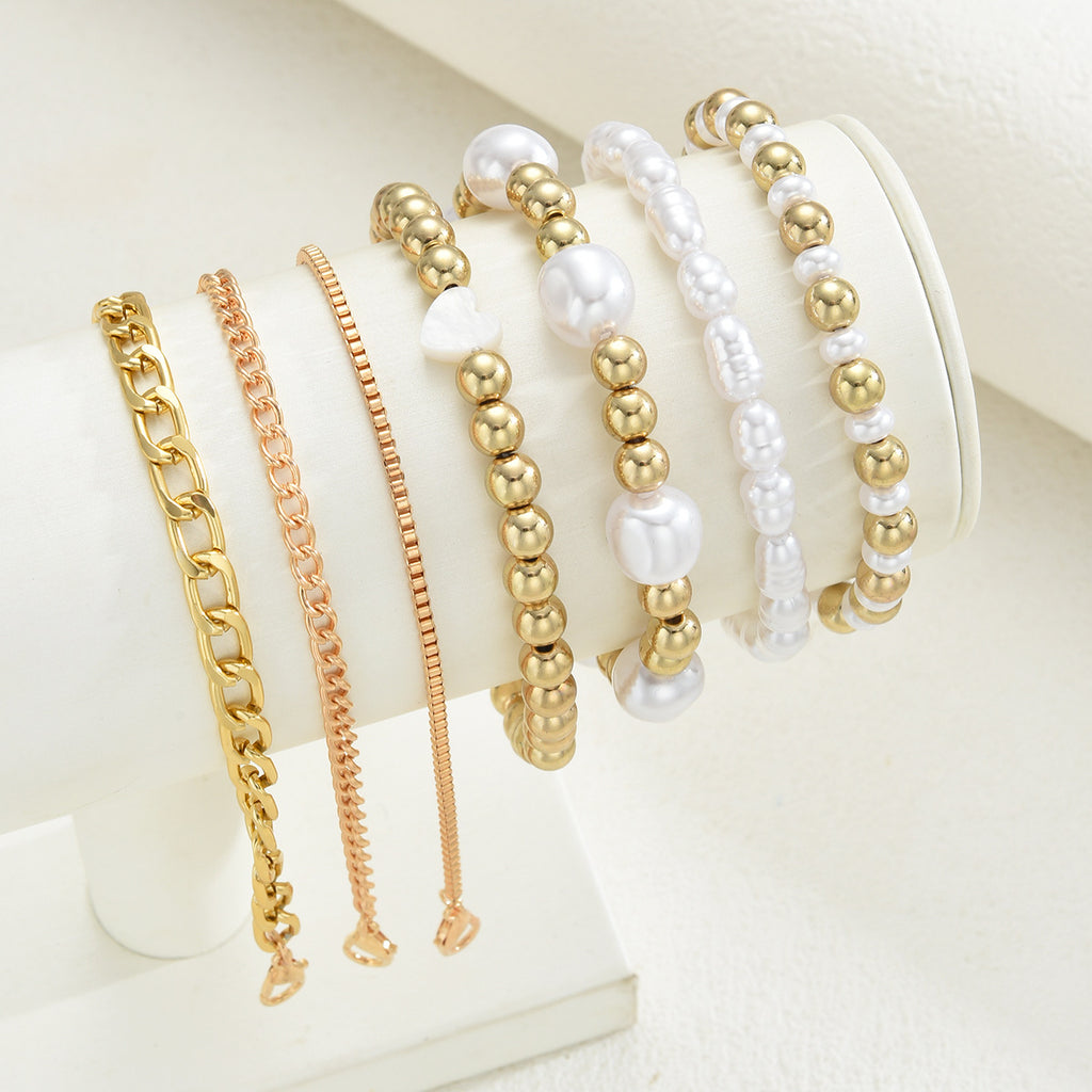 Damen Armband-Set mit eleganten Perlen und goldenen Akzenten Shop Nory