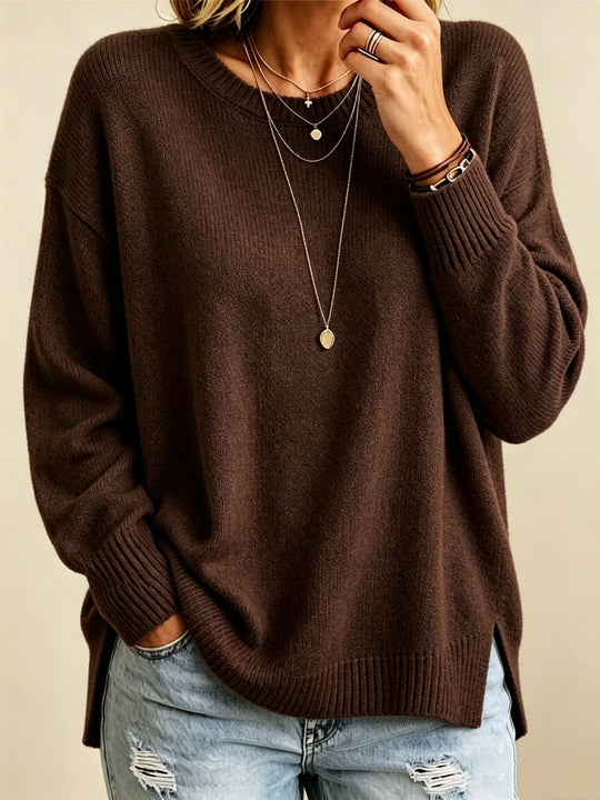Damen Locker geschnittener Rundhals-Feinstrickpullover mit Seitenschlitzen und gerippten Bündchen Shop Nory