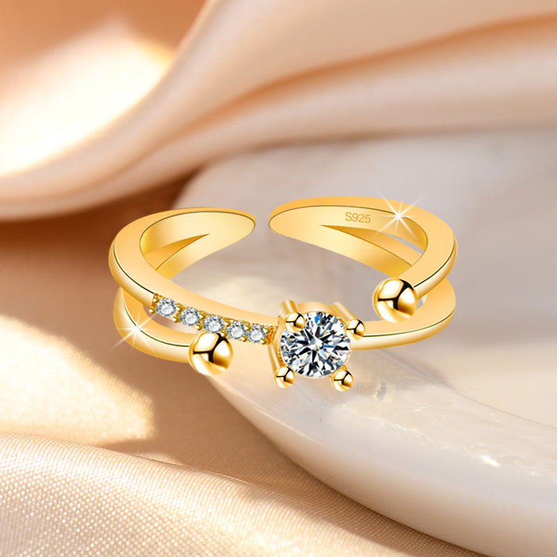 Damenring mit elegantem Wellenmuster und funkelnden Zirkonia Shop Nory