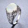 Damen Ring mit kunstvollem Blattdesign und schimmerndem Opal Shop Nory