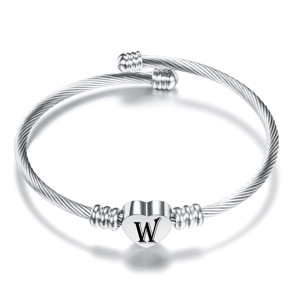 Damen Armreif mit herzförmigem Anhänger und eleganten Akzenten Shop Nory