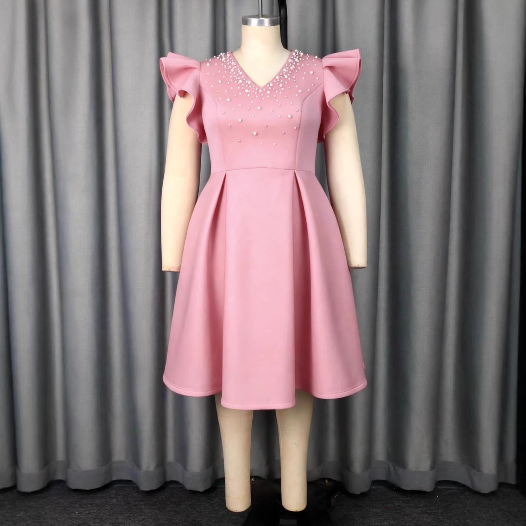 Damen A-Linien Kleid mit glitzernden Perlen und voluminösen Ärmeln