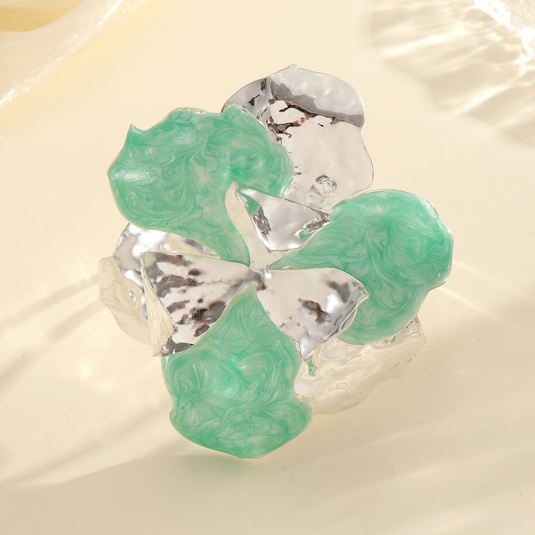 Damen Blütenförmiger Ring aus glänzendem Metall und hochwertigem Epoxidharz Shop Nory