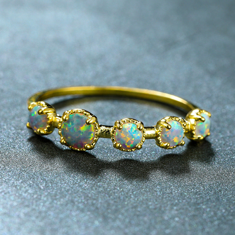 Damen Ring mit schimmerndem Opalmuster und eleganter Zirkonia-Verzierung Shop Nory