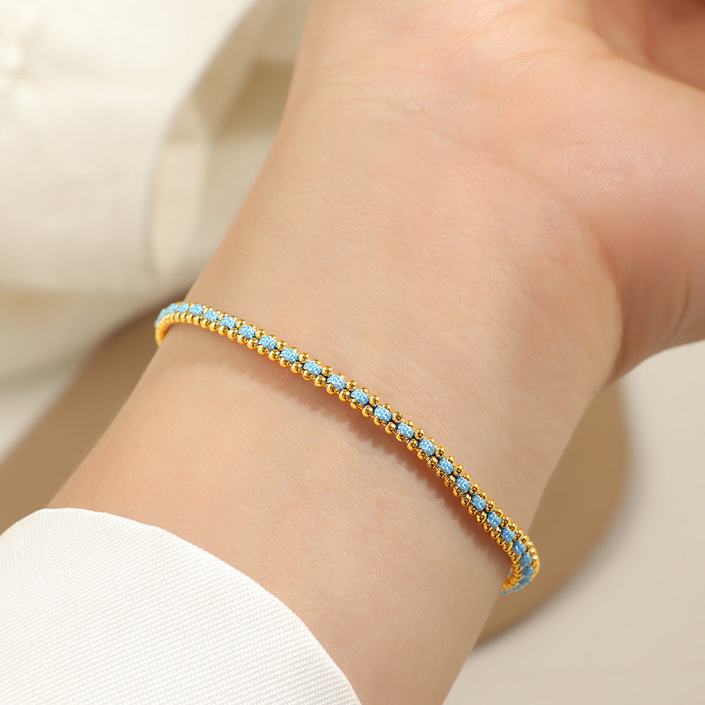 Damen romantisches Armband mit funkelnden roten Zirkonia Shop Nory