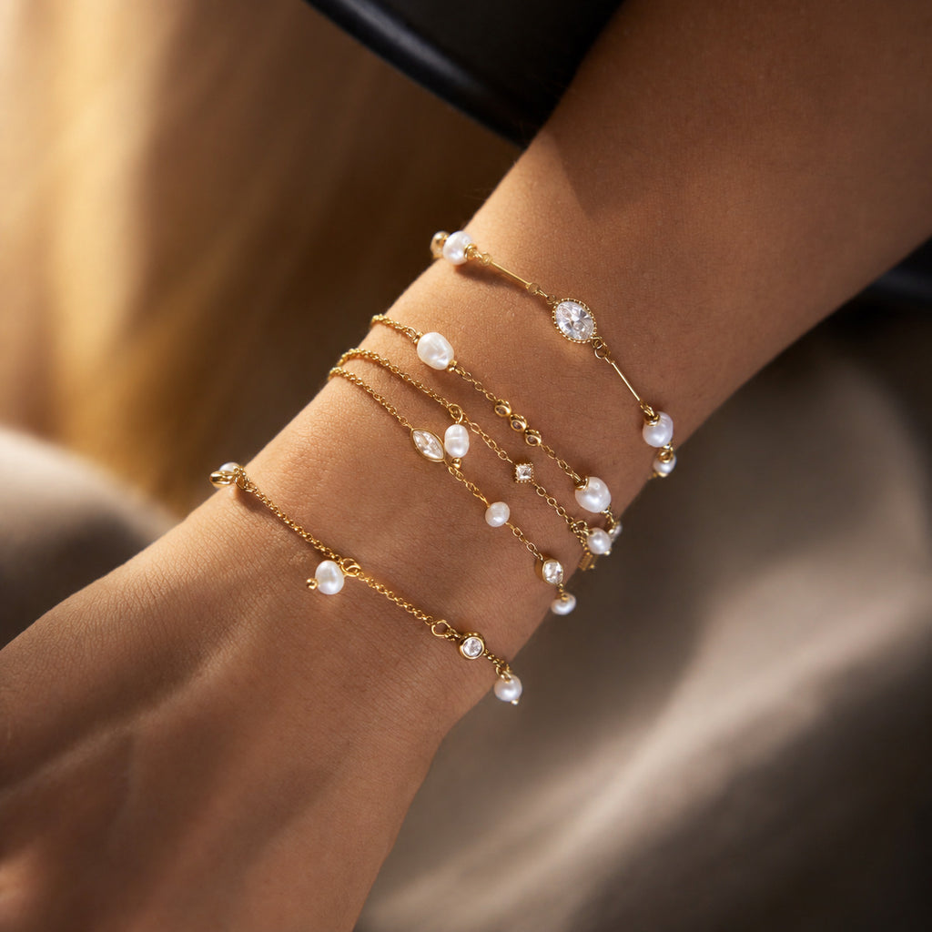 Damen Armband mit glänzenden Zirkonia und eleganten Perlendetails Shop Nory