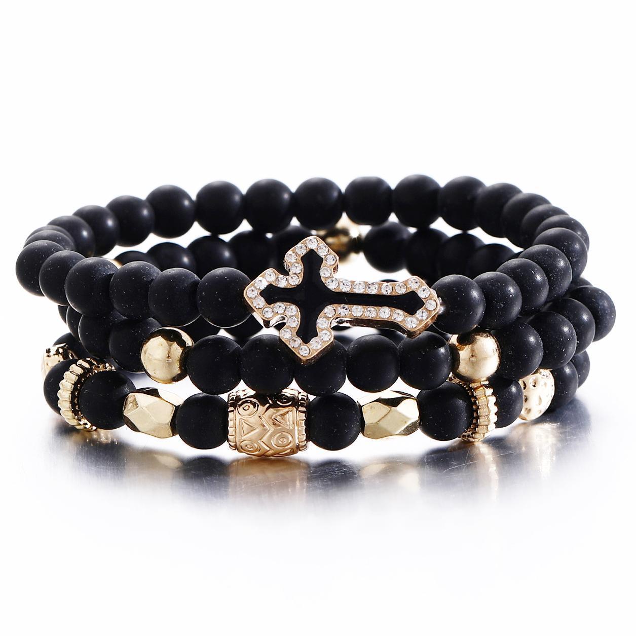 Damen Armreif-Set mit funkelndem Kreuzanhänger und einzigartigen Perlen Shop Nory