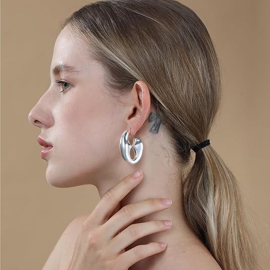 Damen modische Ohrhänger mit skulpturalem Design Shop Nory