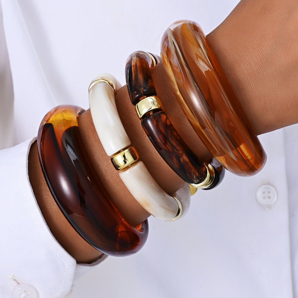 Damenarmreif mit geschwungenem Design und glänzender Oberfläche Shop Nory