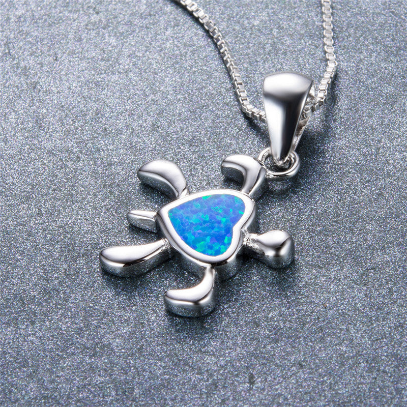 Damen Schmuckanhänger in Schildkrötenform mit herzförmigem Opal-Shop Nory