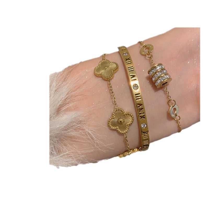 Damenarmband mit kunstvollen Blütenmotiven und hochwertiger Vergoldung Shop Nory