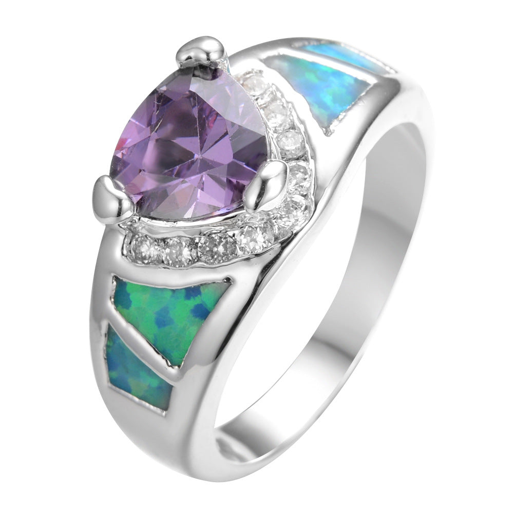 Damen Ring mit facettiertem Amethyst und opalisierenden Elementen Shop Nory