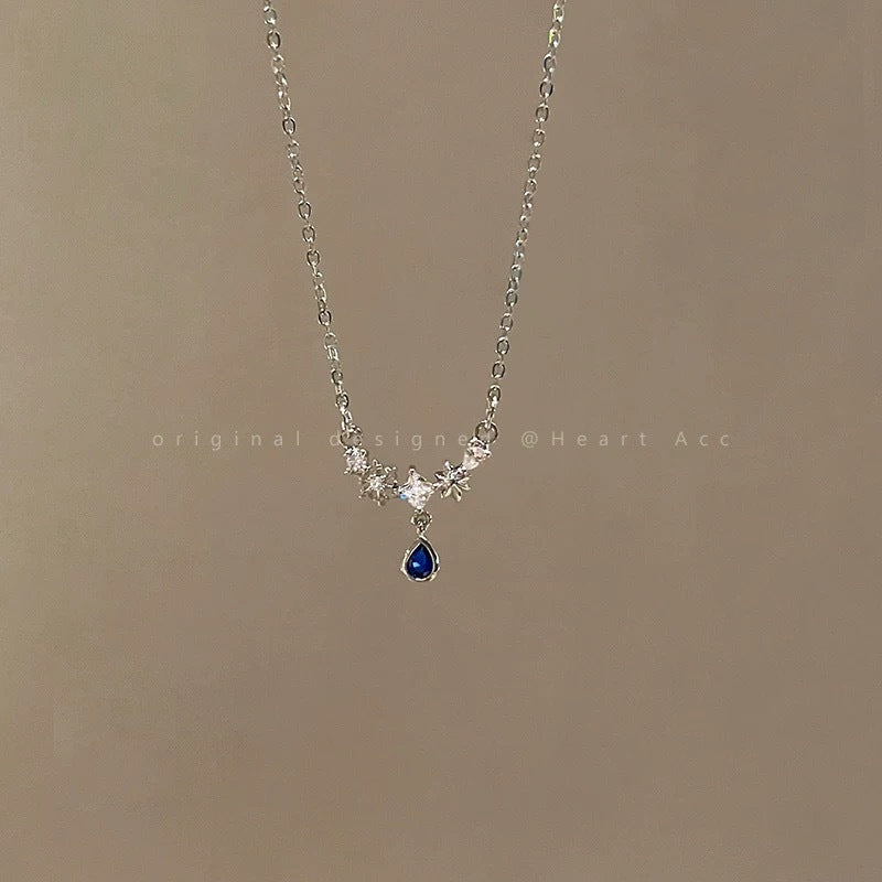 Damen Halskette mit funkelnden Zirkonia und Tropfenanhänger Shop Nory
