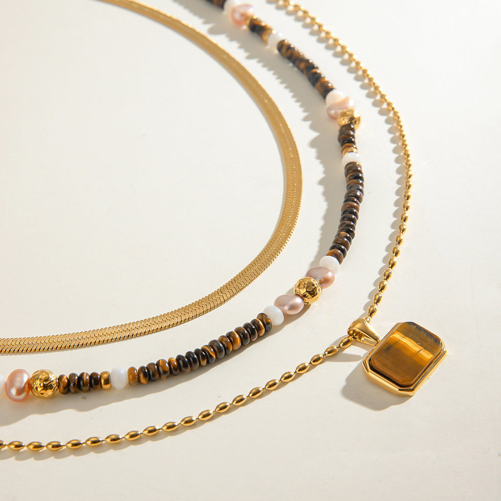 Damen Halskette mit eleganter Tigeraugen-Anhänger aus hypoallergenem Edelstahl Shop Nory