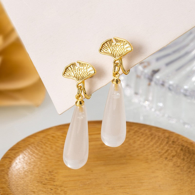 Damen elegante Tropfenohrringe mit feinem Goldakzent Shop Nory