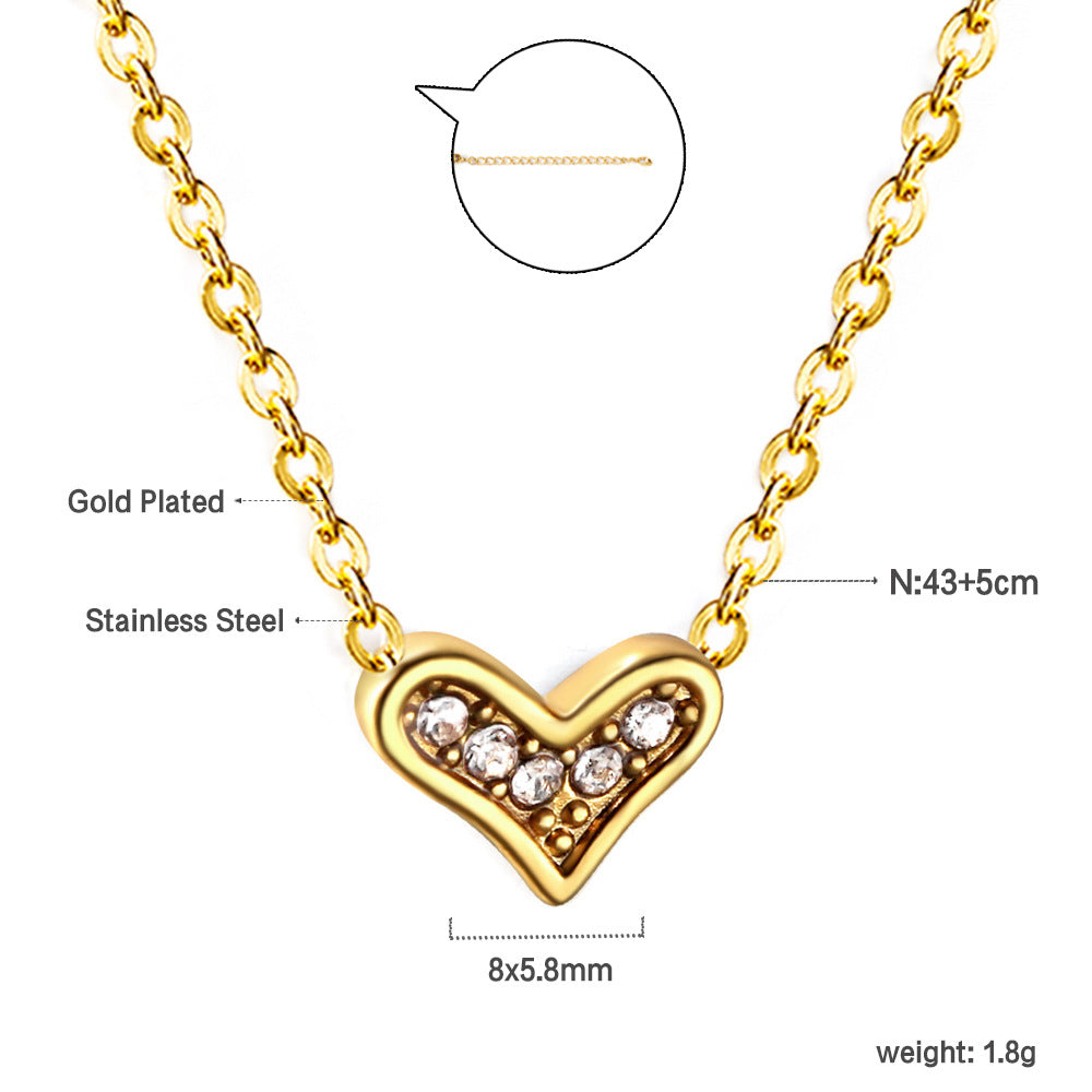 Damen Halskette mit funkelndem Herzanhänger aus goldplattiertem Edelstahl Shop Nory