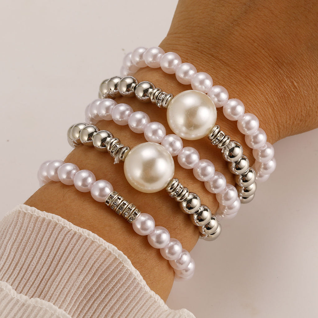 Damen Perlenarmband mit eleganten goldenen Akzenten Shop Nory