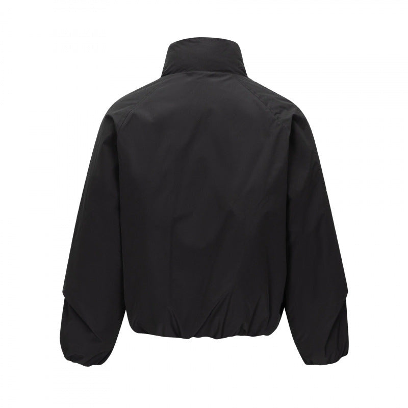 Unisex Kurz geschnittene leichte Windjacke im Boxy-Cut mit hohem Stehkragen und elastischem Saum Shop Nory
