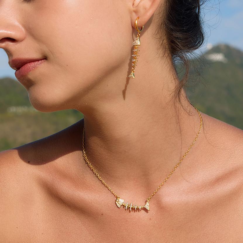 Damen Halskette mit eleganten Fisch-Design und funkelnden Zirkonia Akzenten Shop Nory
