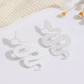 Damen Ohrringe im kunstvollen Schlangen-Design Shop Nory