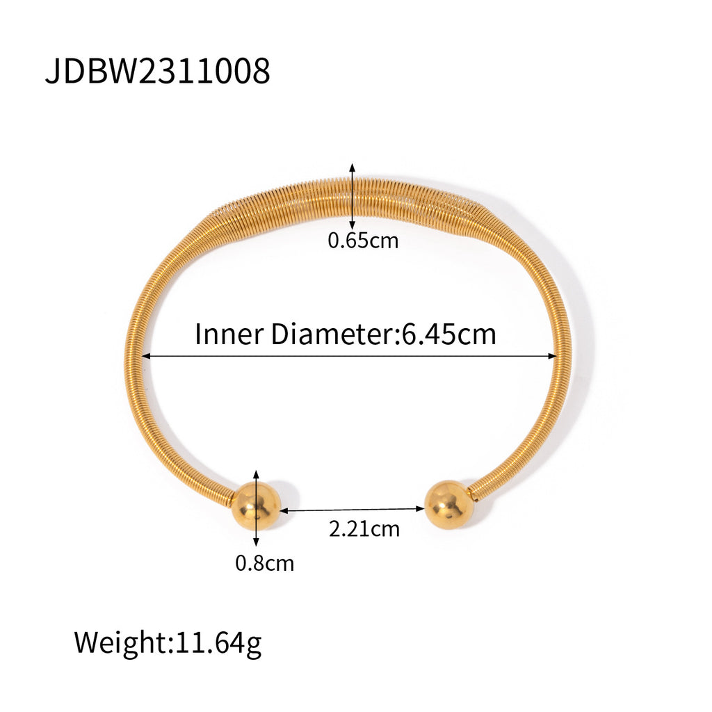 Damen Offenes Armreif mit elegantem Spiral-Design und Goldakzenten Shop Nory