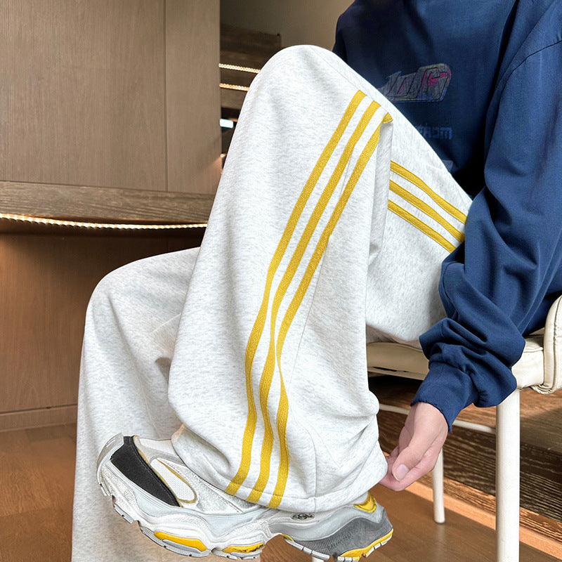 Herren Weitgeschnittene Trainingshose mit seitlichen Streifen Shop Nory