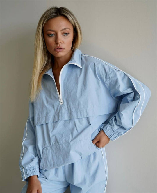 Damen leichtes Half-Zip Windbreaker-Oberteil mit Kängurutasche, elastischen Bündchen und seitlicher Paspel Shop Nory