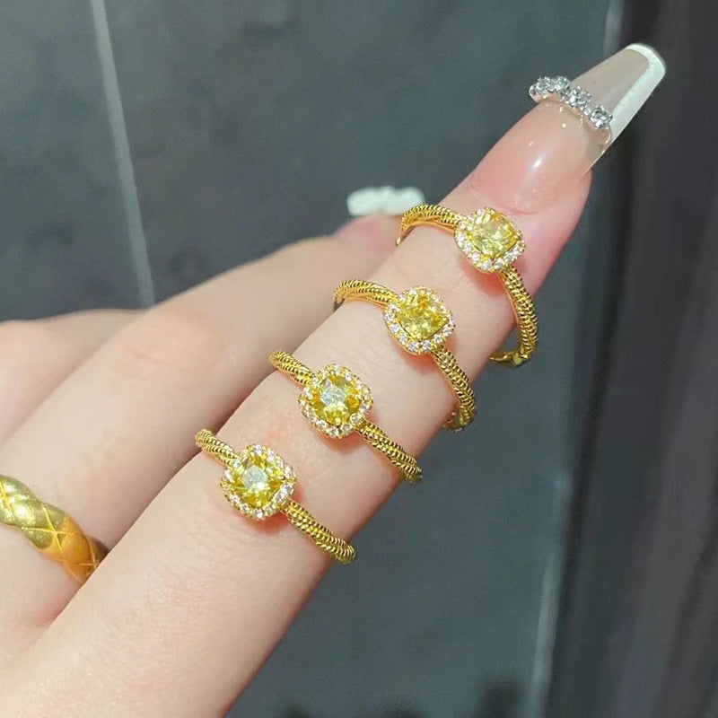 Damen eleganter Ring mit quadratischem Zirkonia und kunstvoller Umrandung Shop Nory