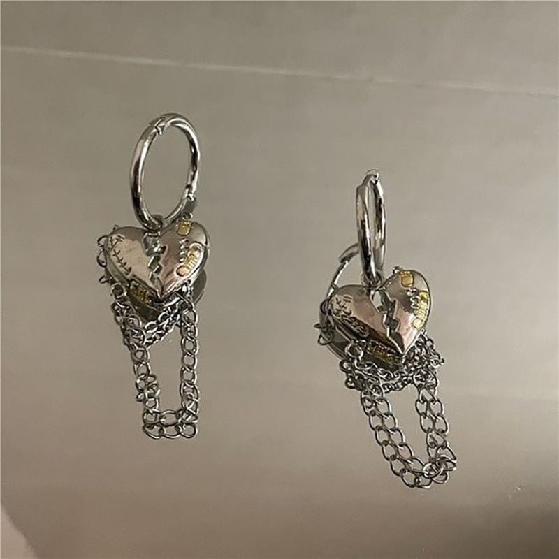 Damen Ohrringe mit funkelnden herzförmigen Anhängern und eleganten Kettendetails Shop Nory
