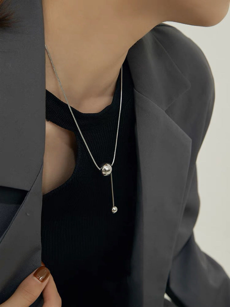 Frauen zeitgenössische minimalistische Ball Anhänger Halskette Shop Nory