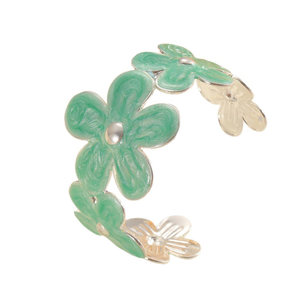Damen Armreif aus hochwertigem Metall mit floralem Design Shop Nory
