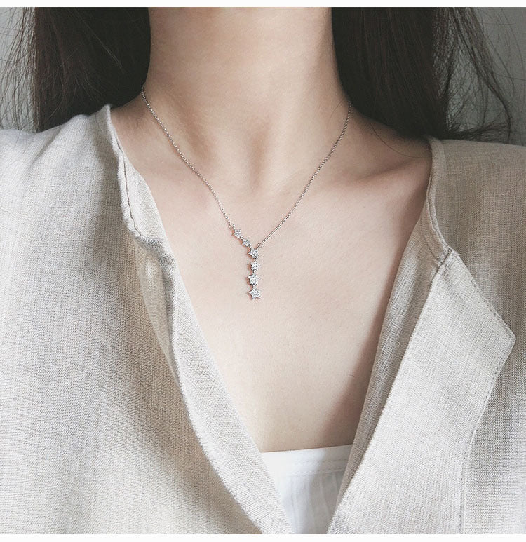 Damen Halskette mit funkelnden Sternen und elegantem Anhänger Shop Nory