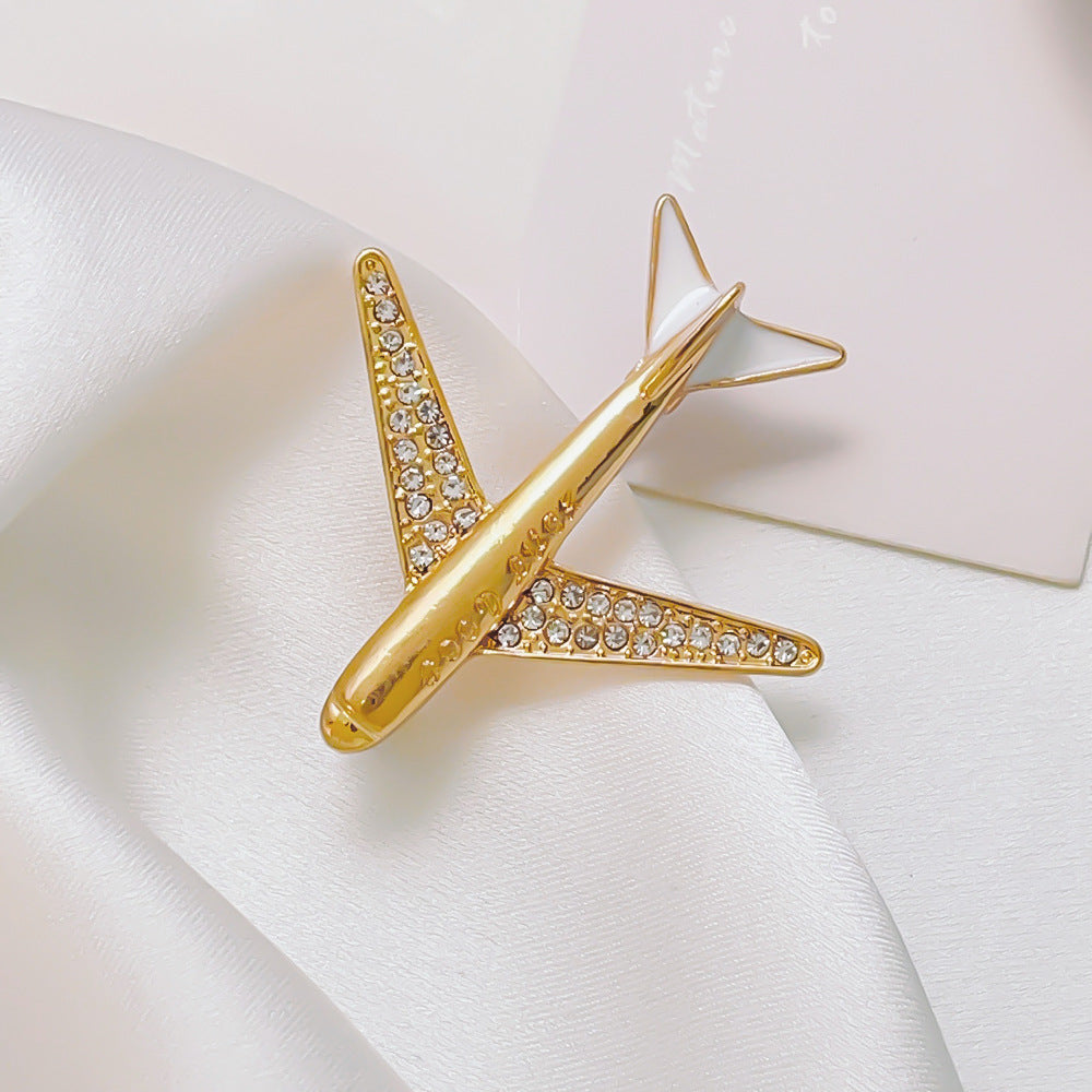 Elegante Flugzeugbrosche mit Kristallbesatz und Sicherem Nadelverschluss