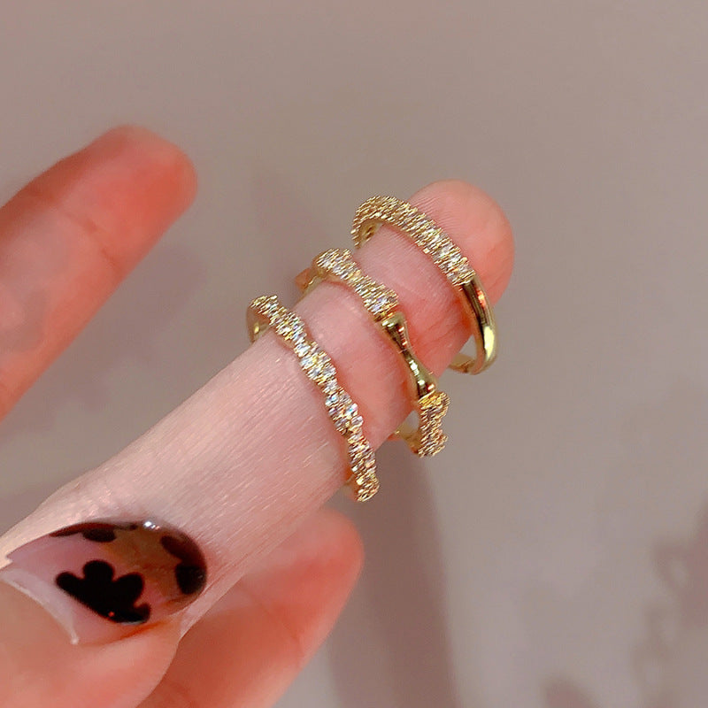 Damen zierlicher Goldring mit kunstvollem Flechtmuster Shop Nory